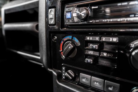 Land Rover Defender 90 TD SOFT TOP XS. MOMO WHEEL. HEATED SEATS. ALPINE STEREO. REAR BENCH SEATS. 30