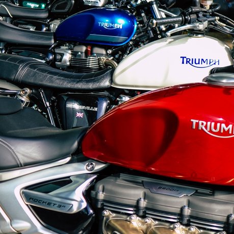 We buy Triumph motorcycles just like these.