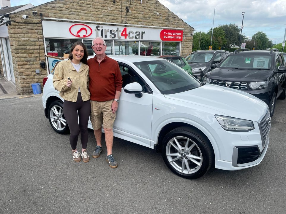 Eve and her Grandad from Skipton collecting her new Audi Q2.
