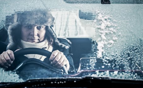 You could be fined for wearing a winter coat behind the wheel