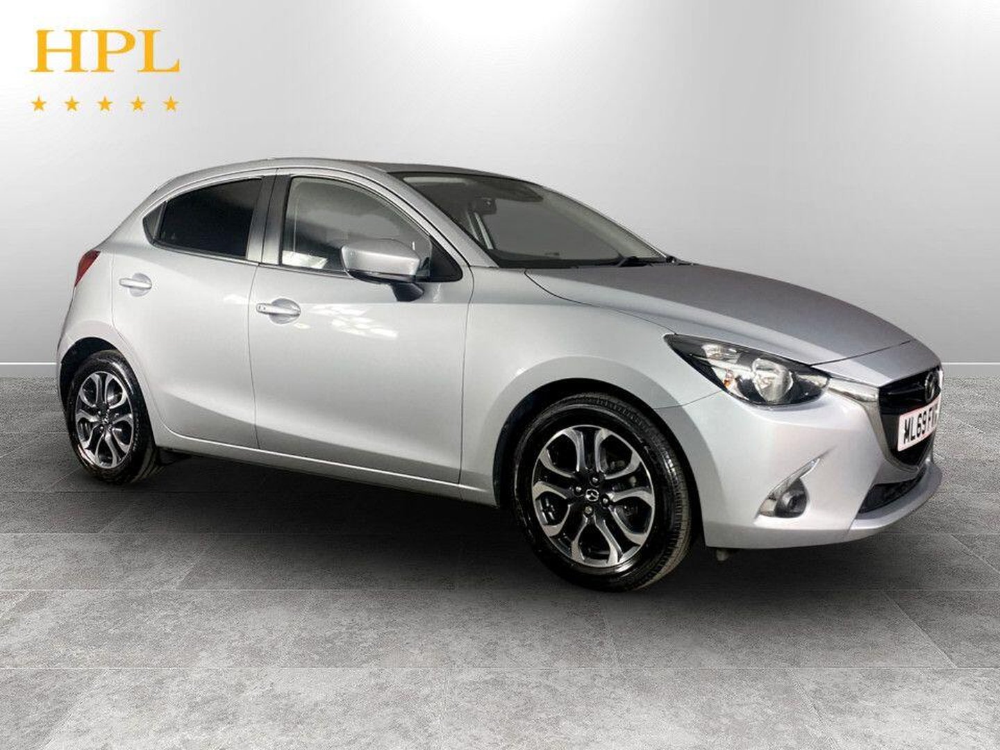Mazda 2 listing photo
