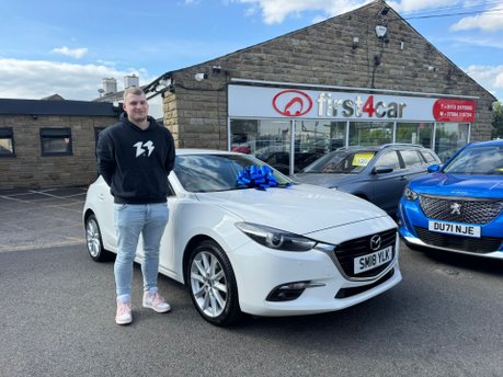 Adam from St Helens collecting his new Mazda 3.