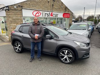 Morris from Leeds collecting his new Peugeot 2008.