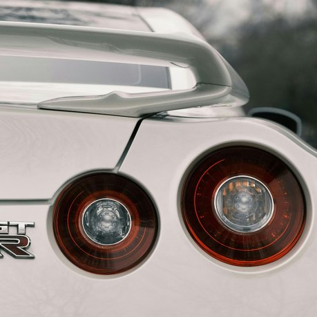 The rear end of a white Nissan GT-R, just like the one's sought by Church's.