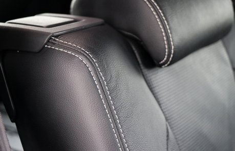 New premium rear seat conversion option for the Land Rover Discovery 5 Commercial, 2024+ models, featuring a white stitch