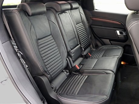 New premium rear seat conversion option for the Land Rover Discovery 5 Commercial, 2024+ models, featuring a white stitch 4