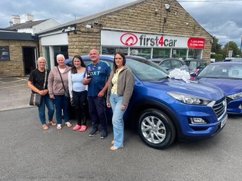 Gary and his family from Leeds collecting their new  Hyundai Tucson.
