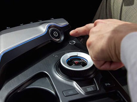 Someone placing their finger on the EV6 recognition.