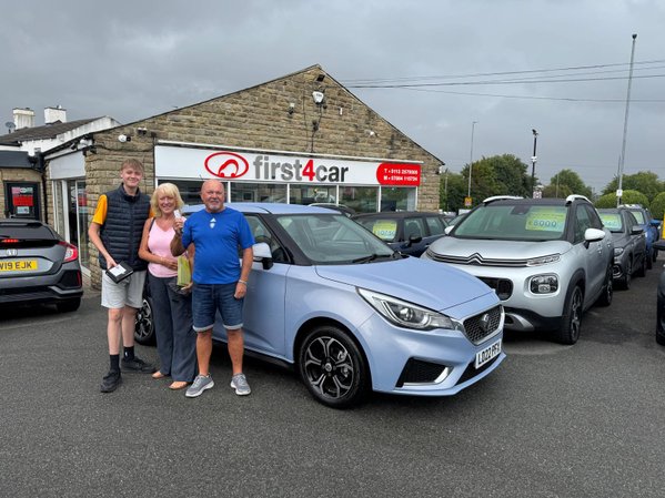 Trevor Denise and Lucas from Brighouse collecting their new MG3.
