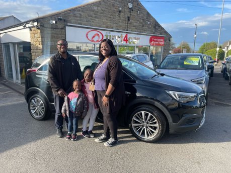 Abigail and her family from Leeds collecting their new Vauxhall Crossland X.