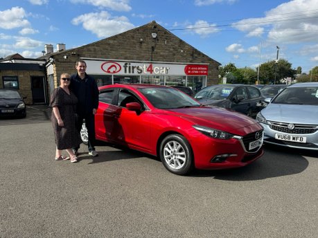 Daniel and Justine from Bradford collecting their new Mazda 3.
