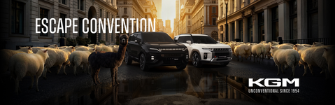 Image of KGM cars in city surrounded by sheep and a llama with "Escape Convention" text.