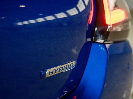 Image of Hybrid logo on Suzuki Swift