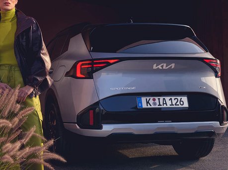 Image of the Kia Sportage parked from the back.