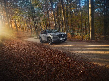 Image of Nissan X-Trail in woods