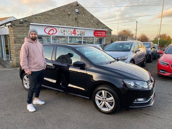 Cathal collecting his new polo