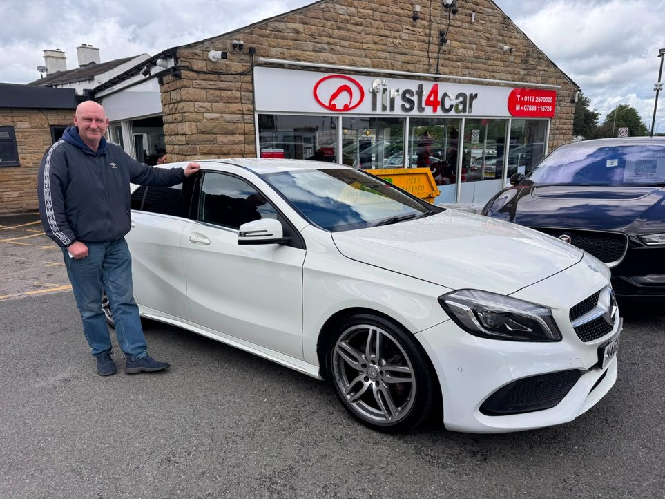 Alec collecting his new Mercedes.