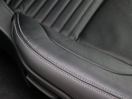 New premium rear seat conversion option for the Land Rover Discovery 5 Commercial, 2024+ models, featuring a white stitch 3