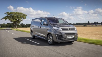 new citron e-dispatch electric - on street, side angle view, grey