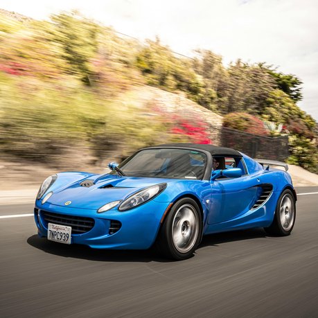 A blue Lotus sports car.