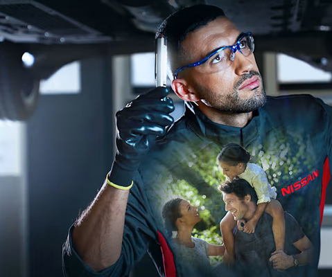 Image of technician working on Nissan.