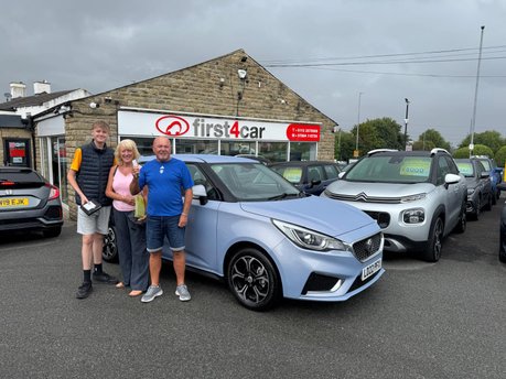 Trevor Denise and Lucas from Brighouse collecting their new MG3.