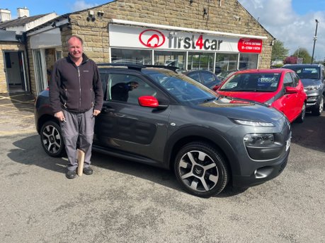 Colin collecting his new car 