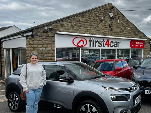 Rebecca from Leeds collecting her new car 