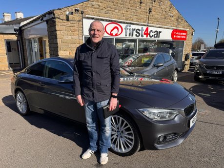 Mr and Mrs Wilson from Grange Over Sands collecting their new BMW 