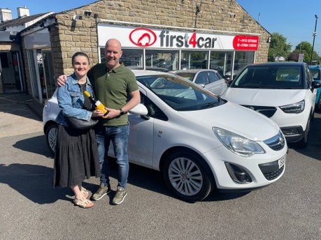 Meghan and Justin collecting their new Vauxhall Corsa