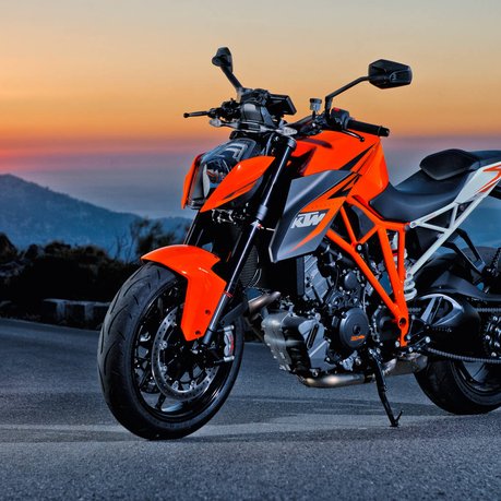 A KTM Super Duke 1290 in sunset.