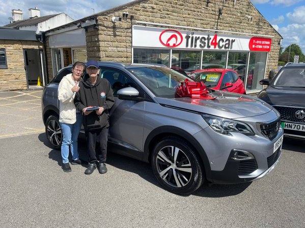 Norman and Clare from Wakefield collecting their new Peugeot.