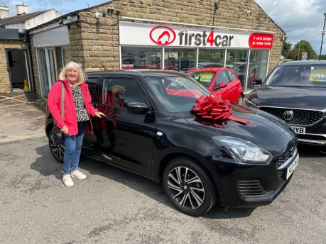 Janice from Leeds collecting her new Suzuki Swift.