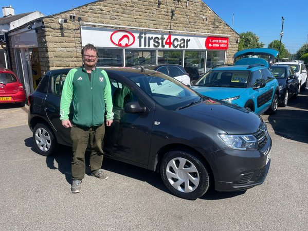 Michael from Pontefract collecting his new Dacia Sandero.