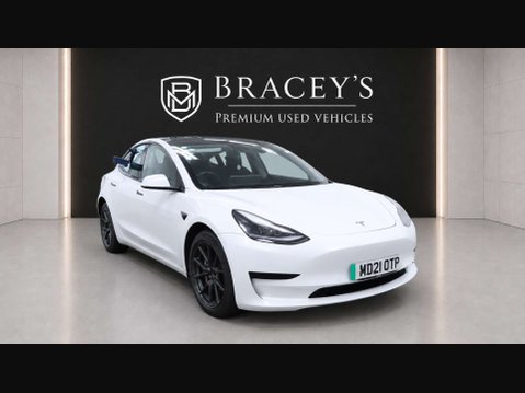 Tesla Model 3 Model 3 Standard Range + 4dr 1