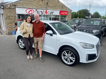 Eve and her Grandad from Skipton collecting her new Audi Q2.