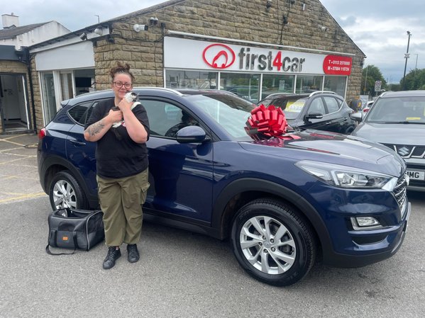 Joanne and her cat Delilah from Leeds collecting their 3rd Car from us a Hyundai Tucson