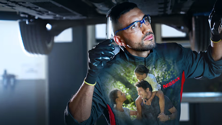 Image of technician working on Nissan.